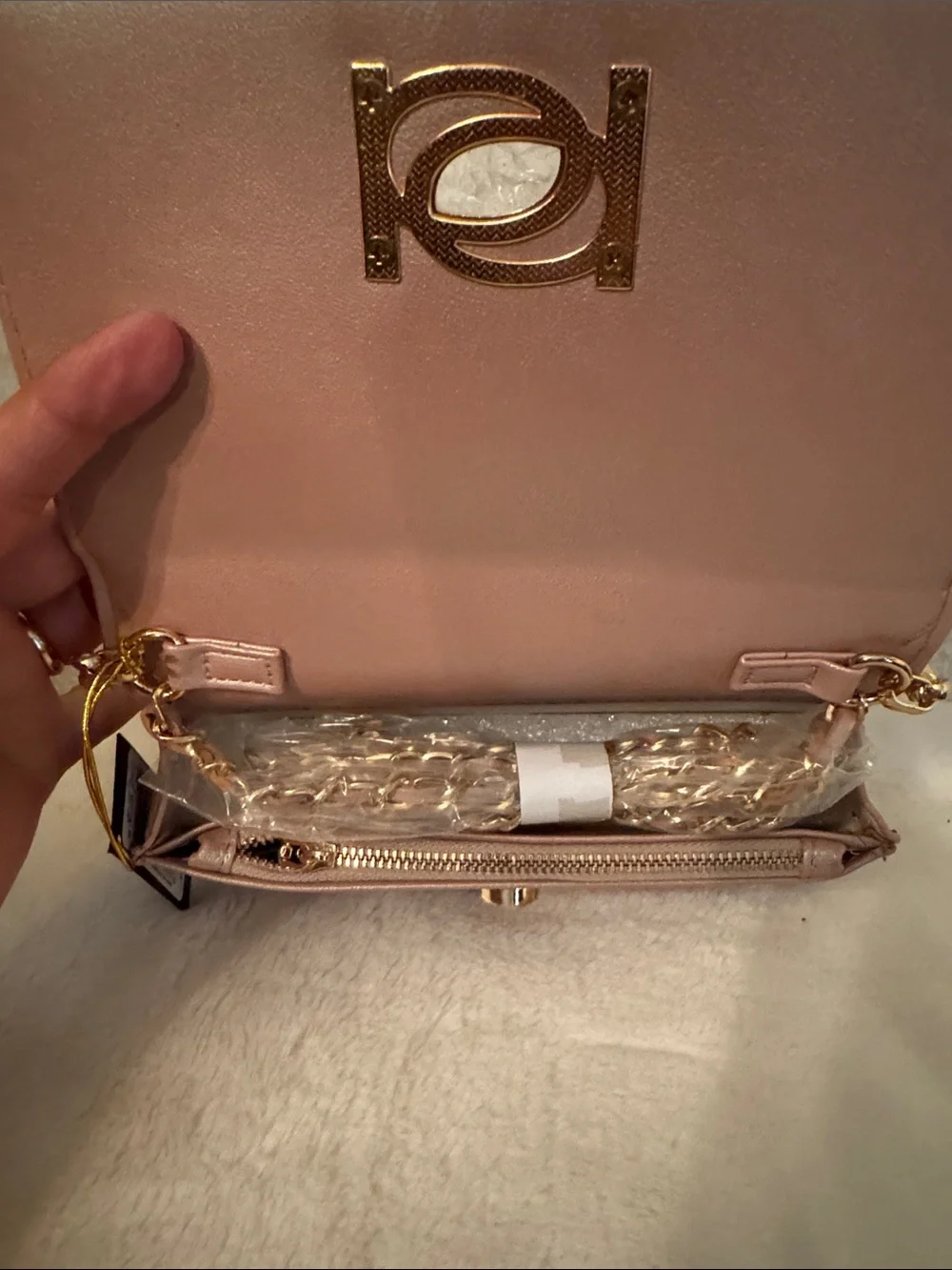 bebe Quilted Chain Shoulder Clutch in Shimmery Blush